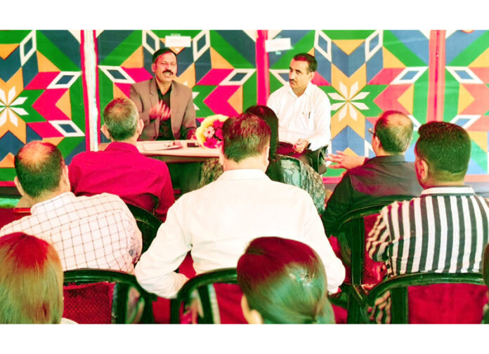 DDP Jammu chairing a meeting of prosecutors in Jammu on Monday.