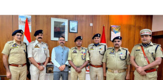 IGP Bhim Sen Tuti decorating newly promoted DySPs in Jammu.