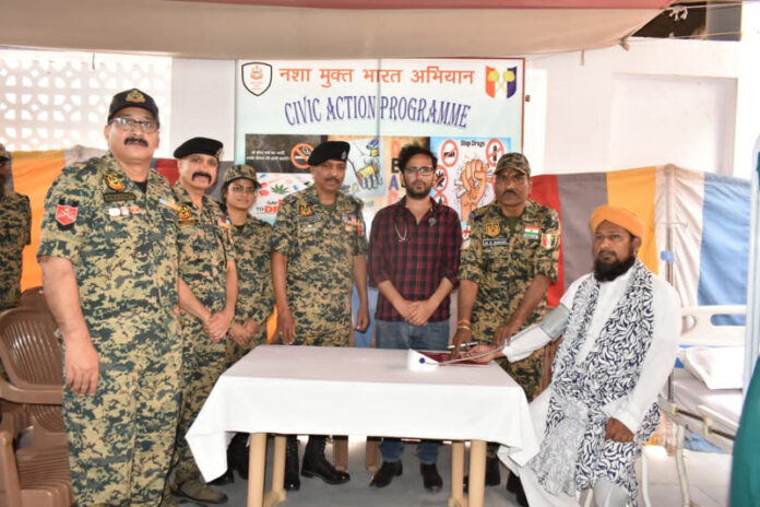 A civilian donating blood during a camp in Mankote Sector of Poonch.