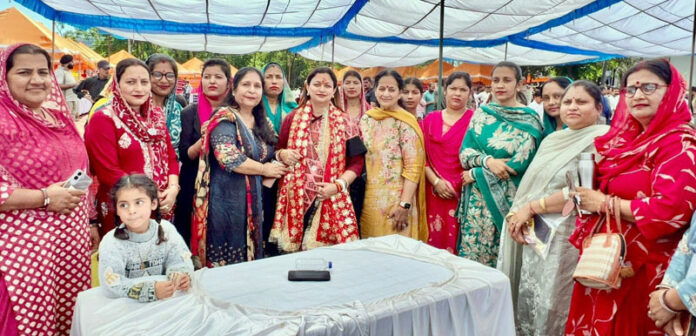 Rekha Mahajan with women workers of BJP Mahila Morcha at Udhampur on Saturday.