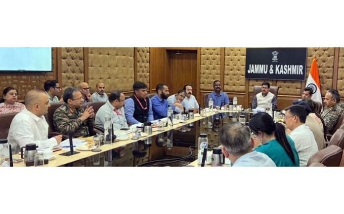 Principal Secretary Chandraker Bharti chairing a meeting on Saturday.