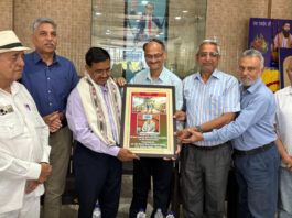 A dignitary being honoured souvenir at Guru Ravidass Gurudwara in Jammu on Sunday.
