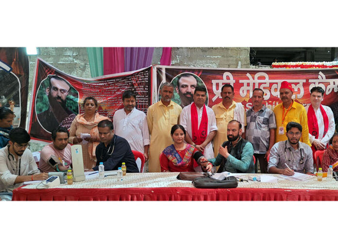 HoD Cardiology, GMCH Jammu, Dr Sushil Sharma and his team during a health camp at Dhammi, Nagrota in Jammu.