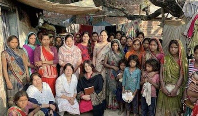 Ritika Trehan posing along with others during a function organized in Jammu. Ritika Trehan posing along with others during a function organized in Jammu.