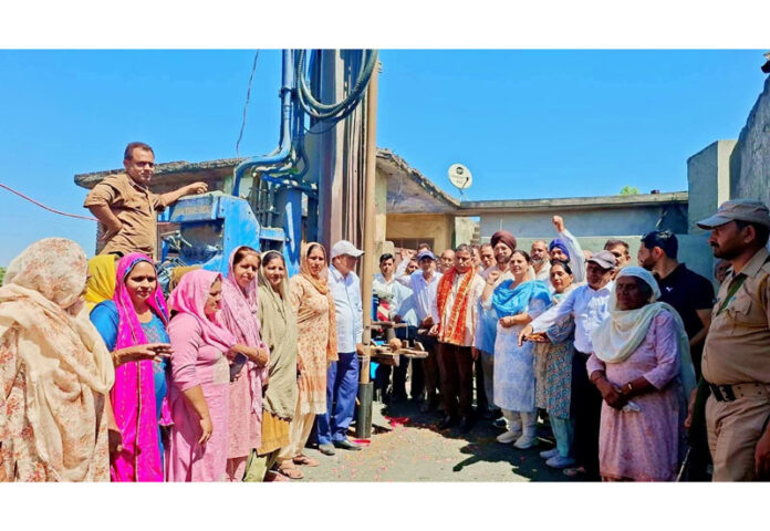 MLA Bharat Bhushan starting borewell construction work at Maira area in Keerian village of Kathua district on Sunday.