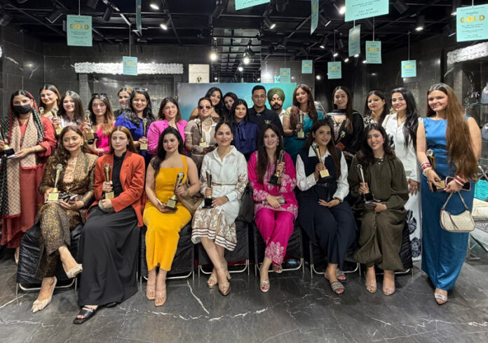 Women honoured by Fortofino posing for a group photograph in Jammu.
