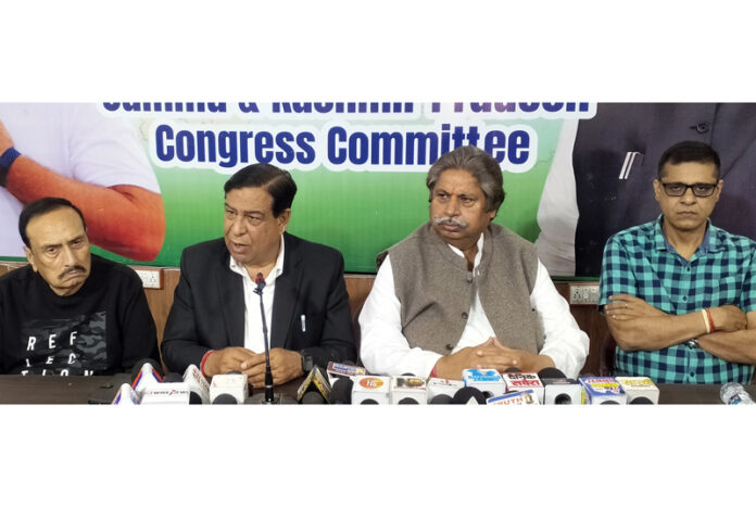 Senior Cong leaders Raman Bhalla, Ravinder Sharma and others addressing joint press conference in Jammu. -Excelsior/Rakesh