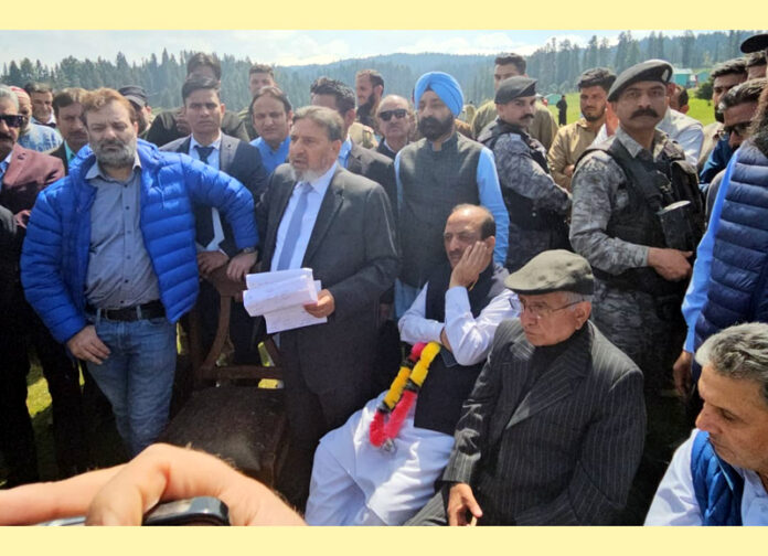 Apni Party leader Altaf Bukhari and others interacting with people at Yusmarg on Wednesday.