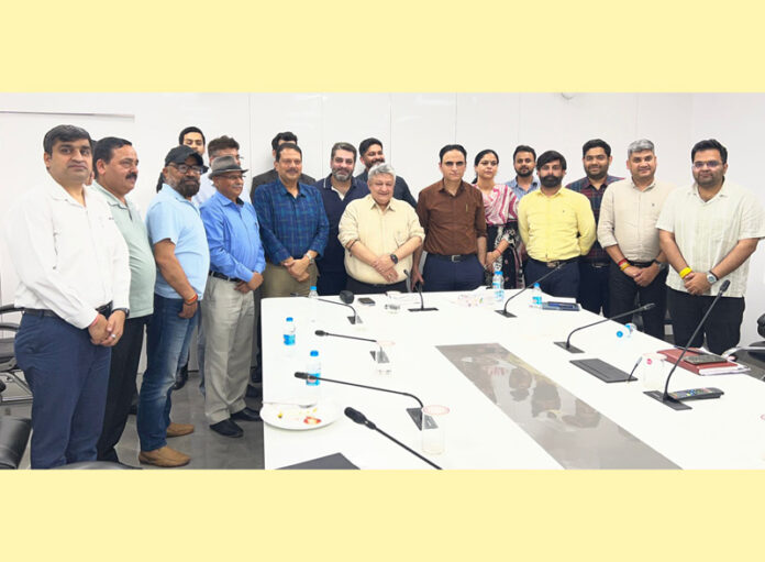 Page9-5 Delegation of FADA Jammu posing for a group photograph with Vishesh Paul, Transport Commissioner J&K.