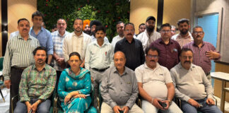 LPG dealers posing together during a meeting at Jammu.