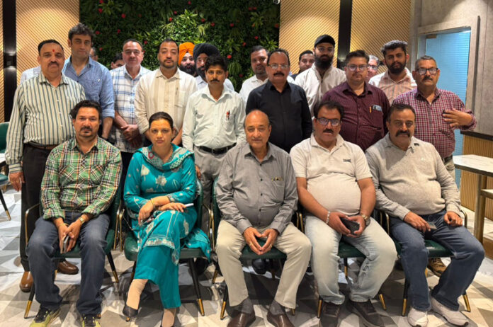 LPG dealers posing together during a meeting at Jammu.