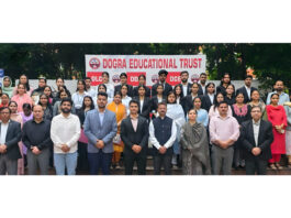 Dignitaries posing during MoU signing programme at Dogra Educational Trust Jammu.