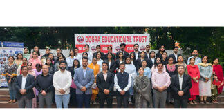 Dignitaries posing during MoU signing programme at Dogra Educational Trust Jammu.