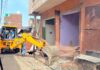 An illegal structure being demolished at Rajiv Nagar area of the Jammu district on Thursday. -Excelsior/Rakesh