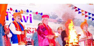 LG Manoj Sinha participating in Tawi Aarti on Tuesday. -Excelsior/Rakesh