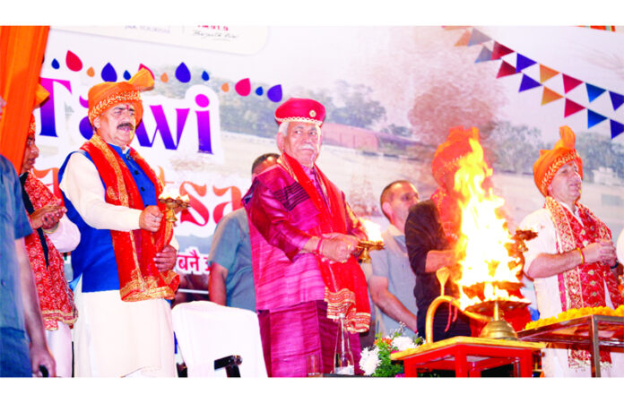 LG Manoj Sinha participating in Tawi Aarti on Tuesday. -Excelsior/Rakesh