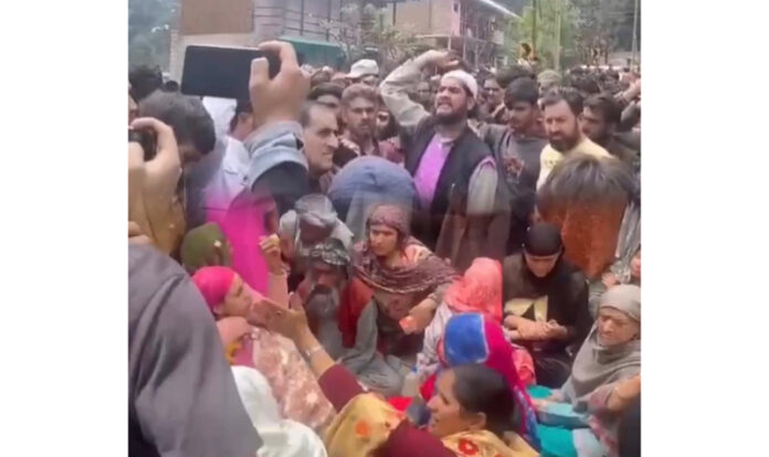 People raise slogans during a protest in Kishtwar on Sunday. -Excelsior/Ajay Shan