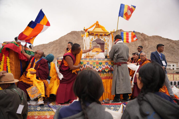 In a grand procession, the holy relics of Buddha being taken from Leh Airport to Jivetsal on Wednesday.