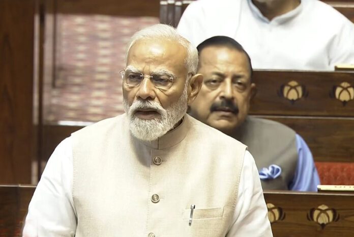 Prime Minister Narendra Modi addresses the Rajya Sabha on Friday. (UNI)