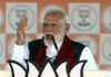 Prime Minister Narendra Modi addresses a Vijay Sankalp Sabha public meeting in Purulia, West Bengal, on Sunday. (UNI)