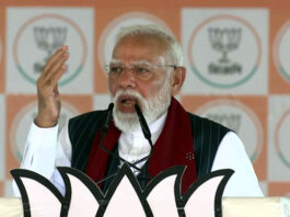 Prime Minister Narendra Modi addresses a Vijay Sankalp Sabha public meeting in Purulia, West Bengal, on Sunday. (UNI)