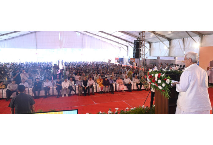 LG Manoj Sinha addressing the gathering at village Sariah in Rajouri on Friday.