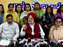 Union Minister Hardeep Singh Puri along with BJP president Sat Sharma and Rajya Sabha MP Rekha Sharma addressing a press conference at Party office in Jammu on Sunday. (UNI )
