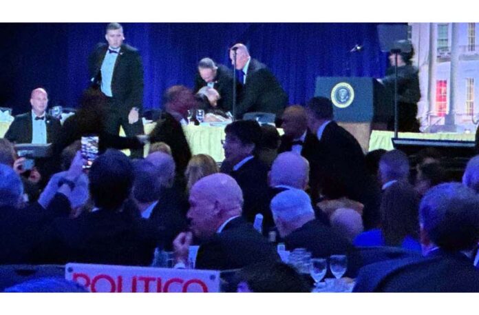 US President Donald Trump and other top officials being evacuated from the annual dinner of White House correspondents after firing.