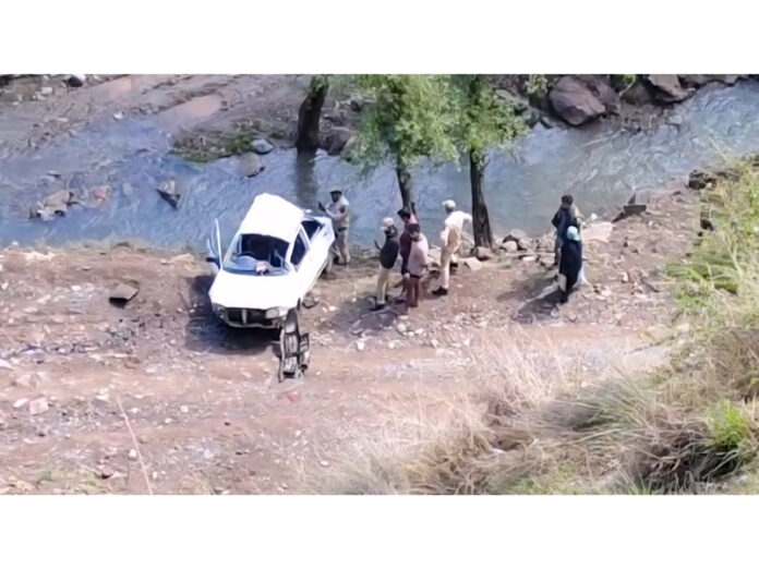 A car rolls down into a Nallah in Fazalabad area of Surankote in Poonch. -Excelsior/Waseem