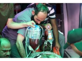 An injured of Ramnagar bus accident being admitted in GMC Jammu. -Excelsior/Rakesh