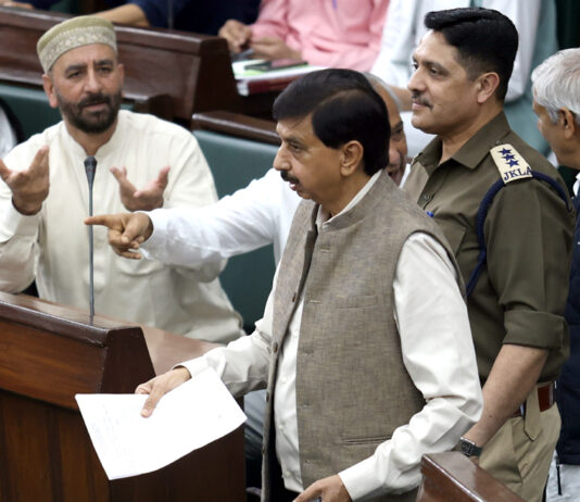 BJP MLA Pawan Gupta protesting in the Assembly before staging walkout on Saturday. -Excelsior/Rakesh