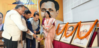 Union Minister Dr Jitendra Singh, Tarun Chugh and others lighting the lamp at party meeting in Jammu on Sunday.