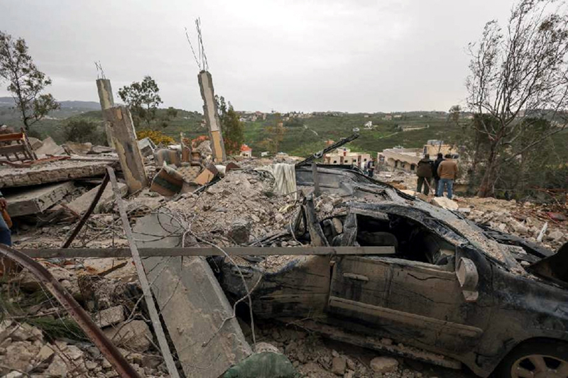 A distroyed car among the rubble of a house hit by an Israeli strike in Lebanon on Wednesday.