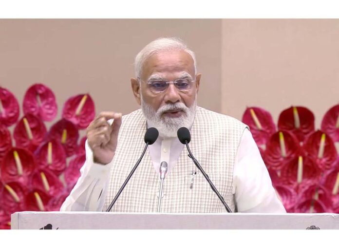 Prime Minister Narendra Modi addresses the ‘Nari Shakti Vandan Sammelan’ at Vigyan Bhawan, in New Delhi on Monday. (UNI) Prime Minister Narendra Modi addresses the ‘Nari Shakti Vandan Sammelan’ at Vigyan Bhawan, in New Delhi on Monday. (UNI)