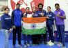 J&K Wushu athletes posing along with support staff.