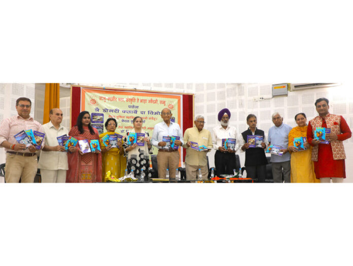 Guests releasing Dogri books during function by JKAACL.