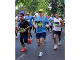 J&K Chief Minister Omar Abdullah running during TCS World 10K Marathon in Bengaluru.