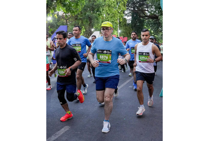J&K Chief Minister Omar Abdullah running during TCS World 10K Marathon in Bengaluru.