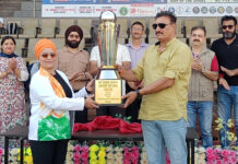 Jambu Lochan T20 Cricket tourney begins Dignitaries unveiling the tournament trophy at opening ceremony.