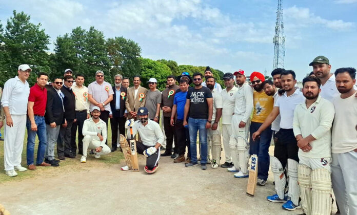 Dignitaries posing along with players during an event. Dignitaries posing along with players during an event.