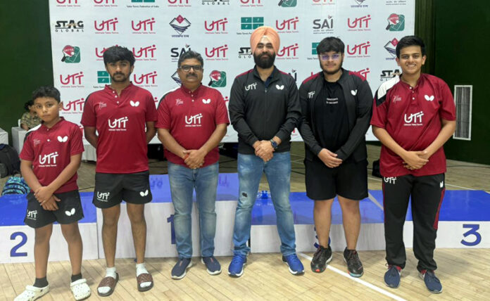 J&K Table Tennis players posing for a group photograph.