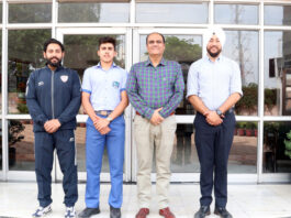 Puneesh Puri posing along with school management.