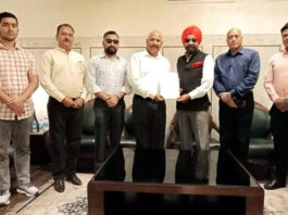 SS Sodhi honouring J&K Shooting coaches during a programme.