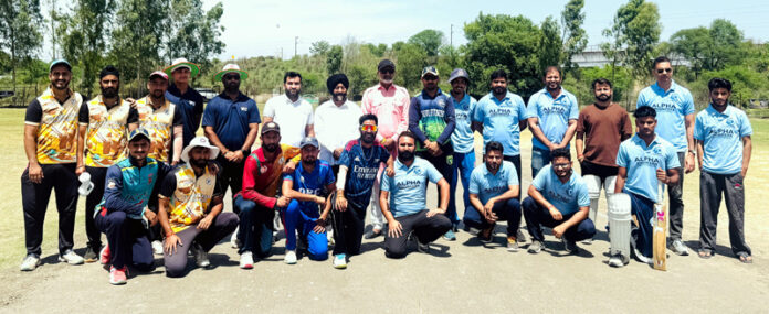 Players posing along with dignitaries during an event.