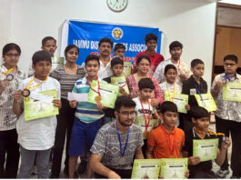 Winners posing along with certificates during closing ceremony.