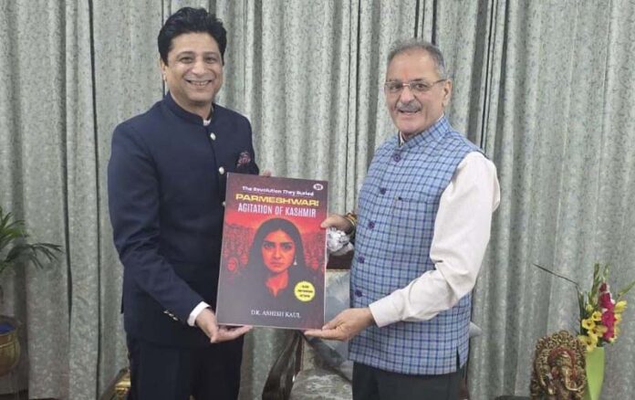 Dr Ashish Kaul presenting his book to HP Governor, Kavinder Gupta. Dr Ashish Kaul presenting his book to HP Governor, Kavinder Gupta.