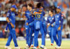 MI players celebrating after defeating Gujarat Titans in Ahmedabad.