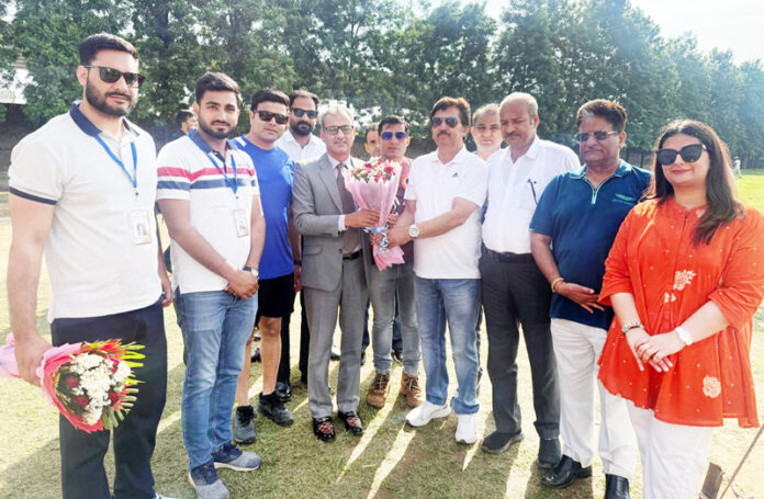 Bar members presenting a bouquet to MLA Thanamandi, Muzaffar Iqbal Khan.