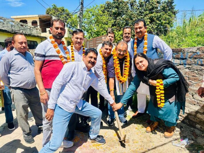 MLA Bahu, Ch. Vikram Randhawa starts the construction work of lanes and drains in Ward No. 3 of Jammu Cantonment on Monday.