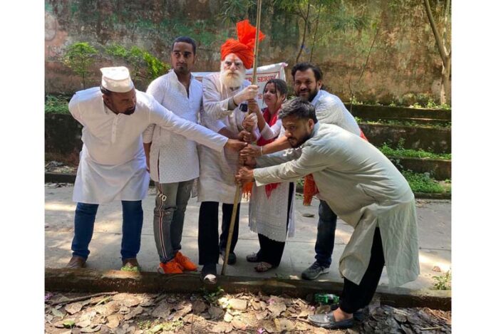 Artists performing in the street play ‘Atamchintant’ staged in Jammu on Monday.